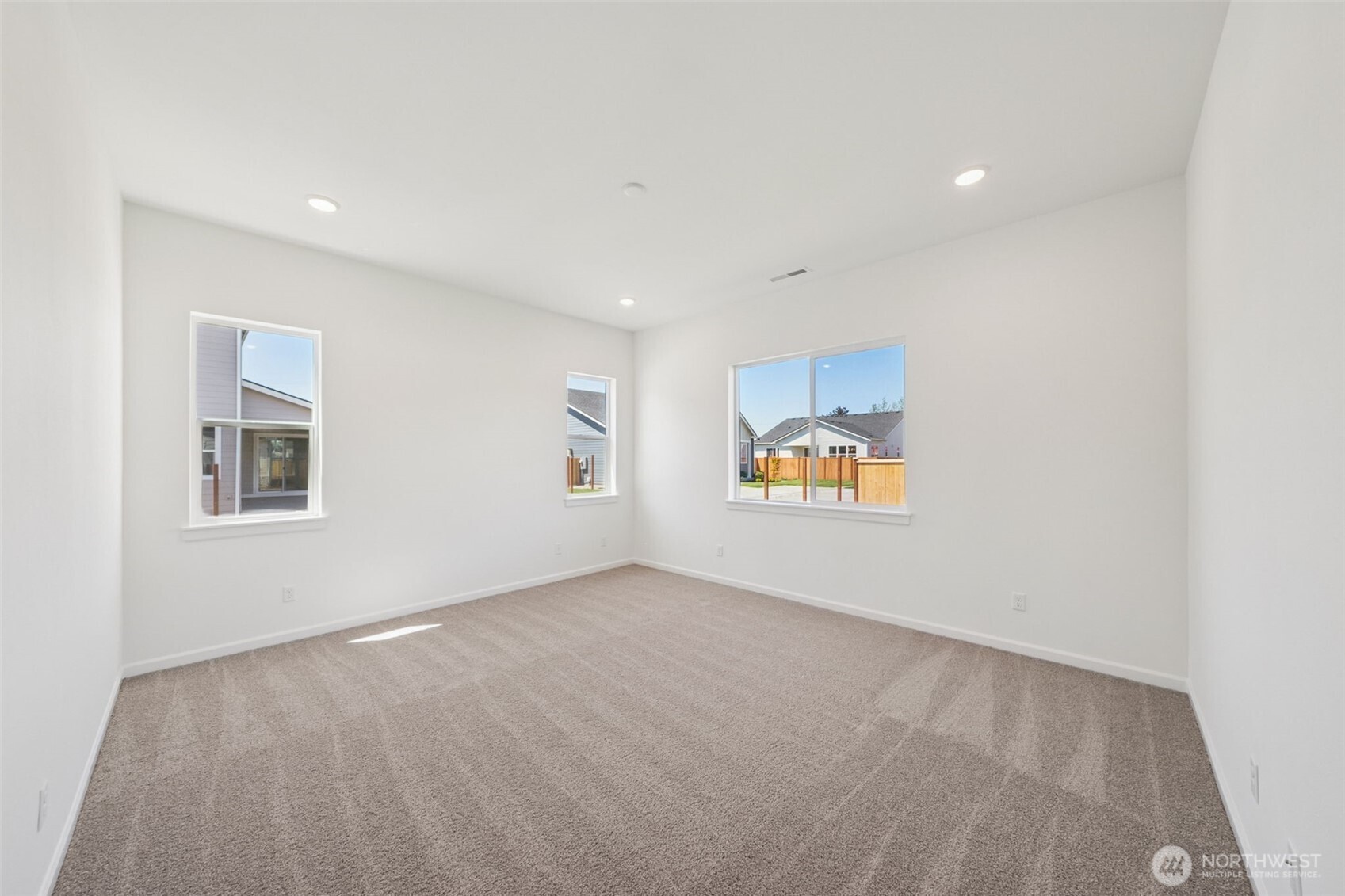 932 Lucas Avenue, Unit 21 Buckley, WA 98321 - Photo 28 of 30 an empty room with windows