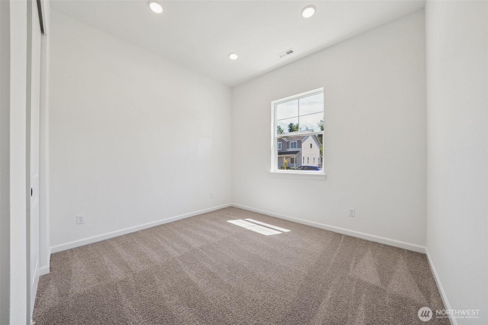932 Lucas Avenue, Unit 21 Buckley, WA 98321 - Photo 3 of 30 an empty room with windows