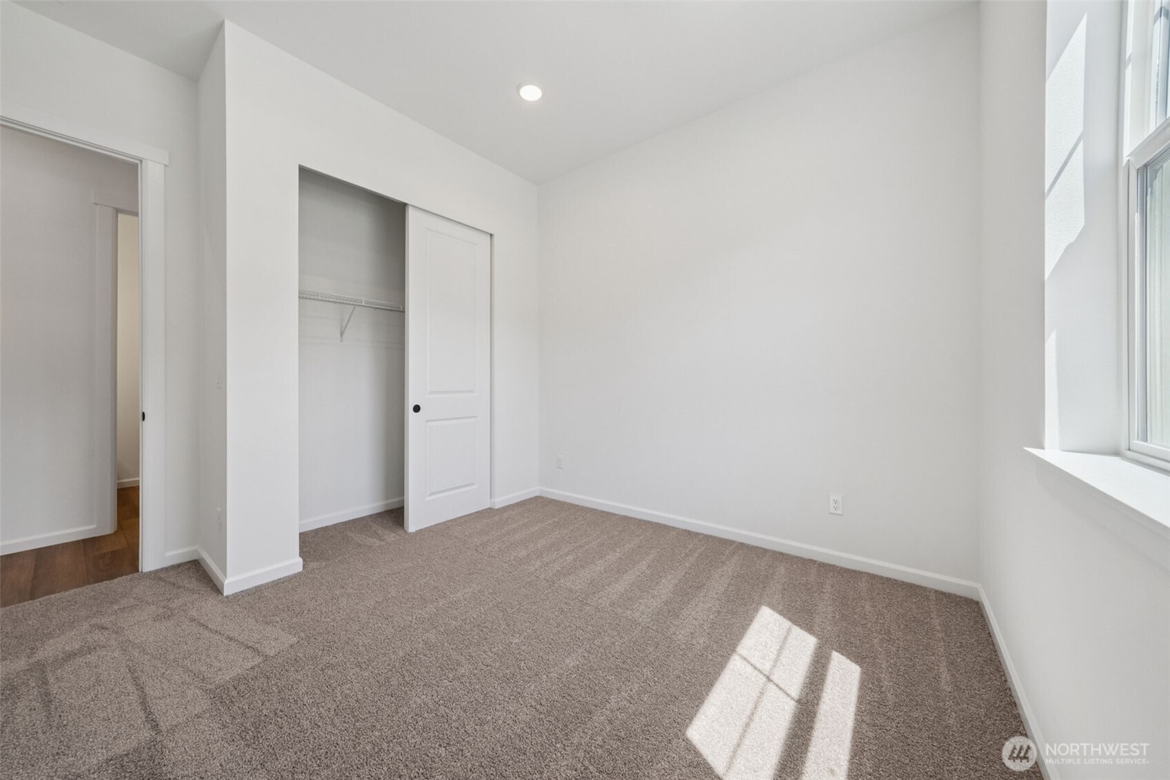 932 Lucas Avenue, Unit 21 Buckley, WA 98321 - Photo 4 of 30 an empty room with windows