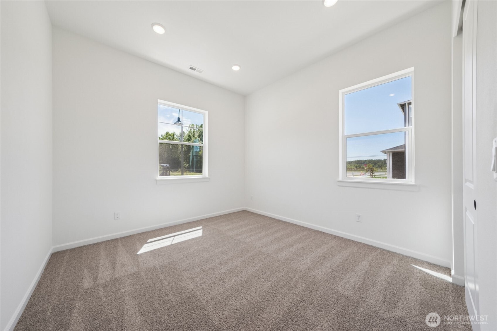 932 Lucas Avenue, Unit 21 Buckley, WA 98321 - Photo 5 of 30 an empty room with windows