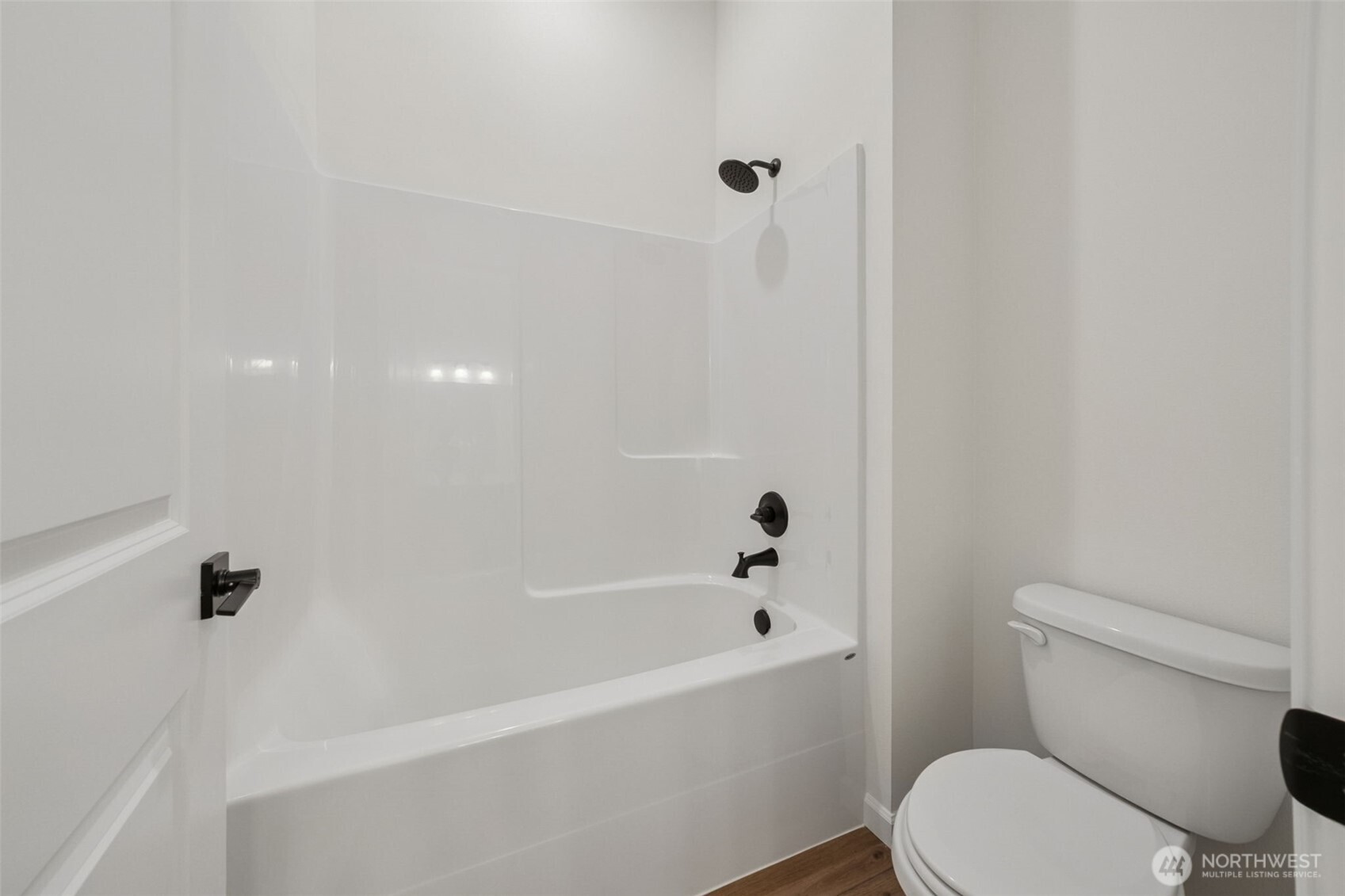 932 Lucas Avenue, Unit 21 Buckley, WA 98321 - Photo 9 of 30 a white bath tub sitting next to a white toilet