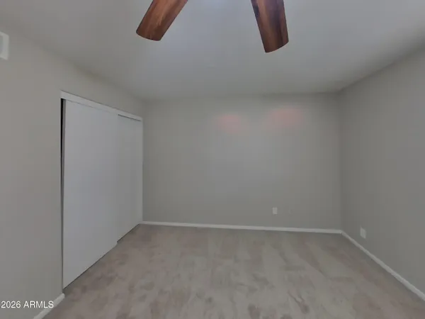 a kitchen with a sink cabinets and stainless steel appliances