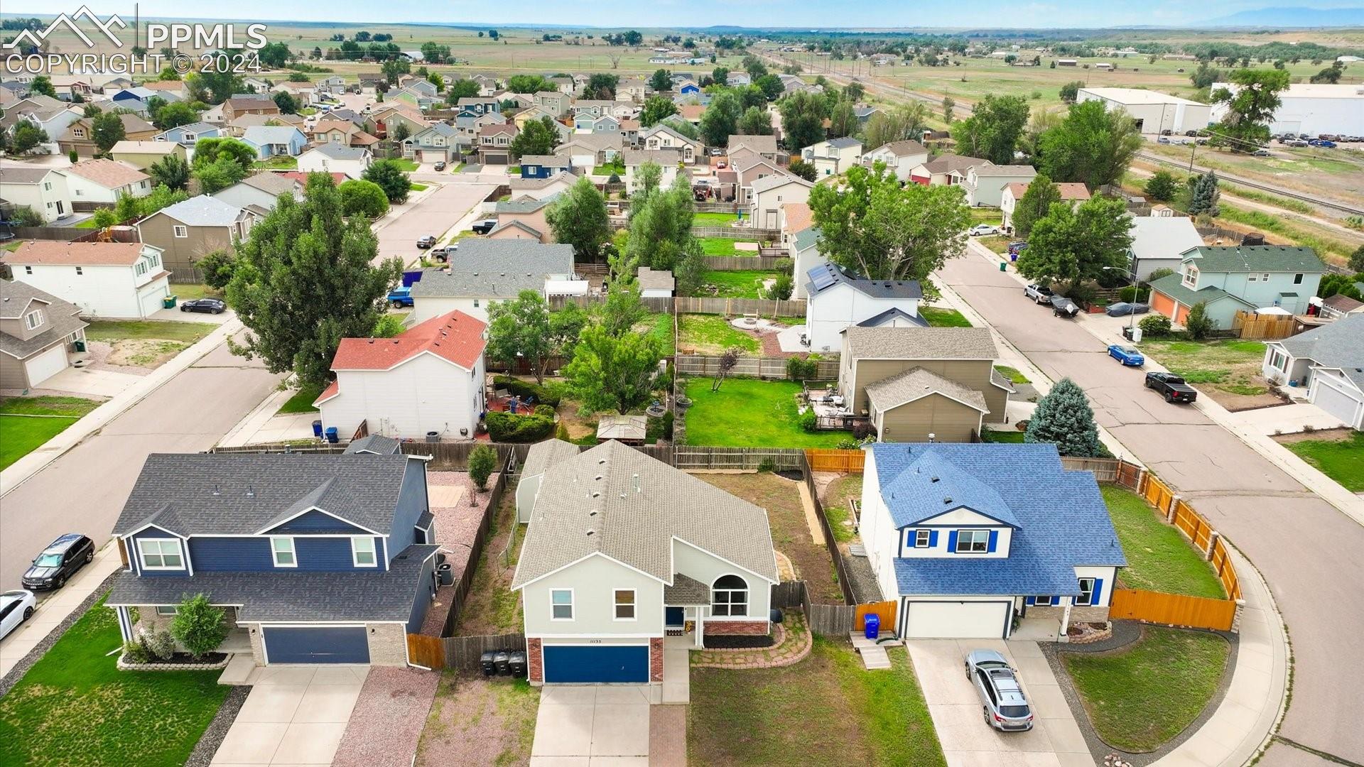 11135 Berry Farm Road Fountain, CO 80817 - Photo 2 of 39 Aerial front view of home and neighborhood