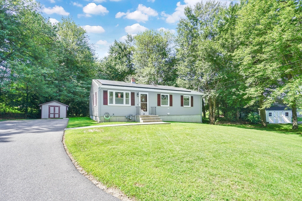 19 Ruthven Street Springfield, MA 01128 - Photo 1 of 19 a front view of a house with a yard