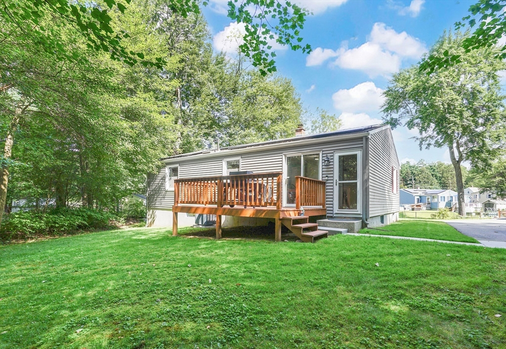 19 Ruthven Street Springfield, MA 01128 - Photo 17 of 19 a house view with a sitting space and garden