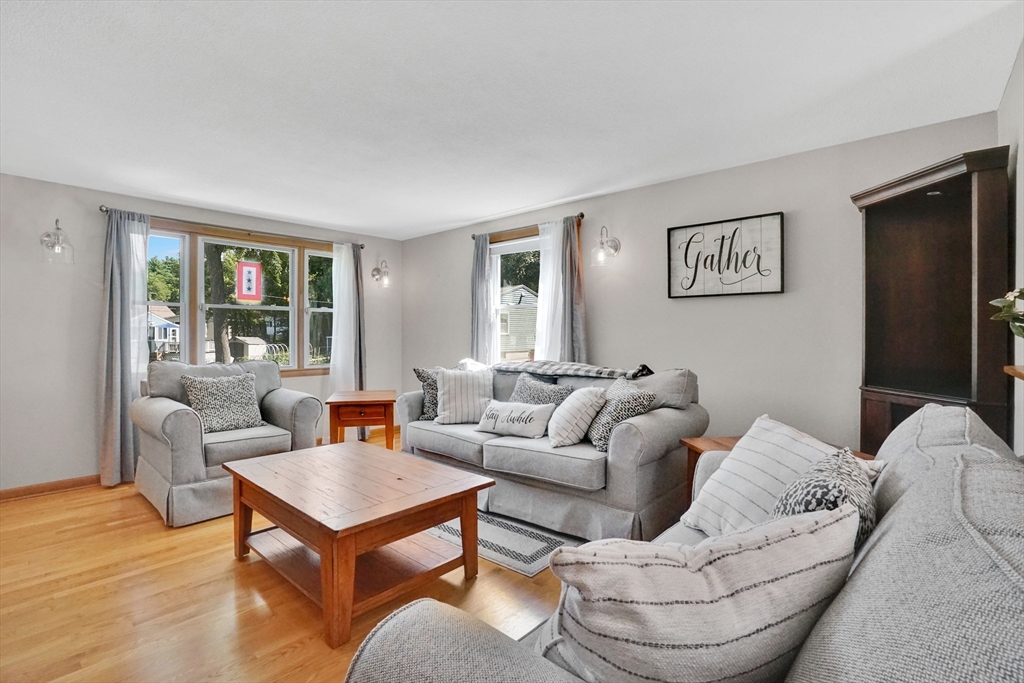19 Ruthven Street Springfield, MA 01128 - Photo 3 of 19 a living room with furniture and a window