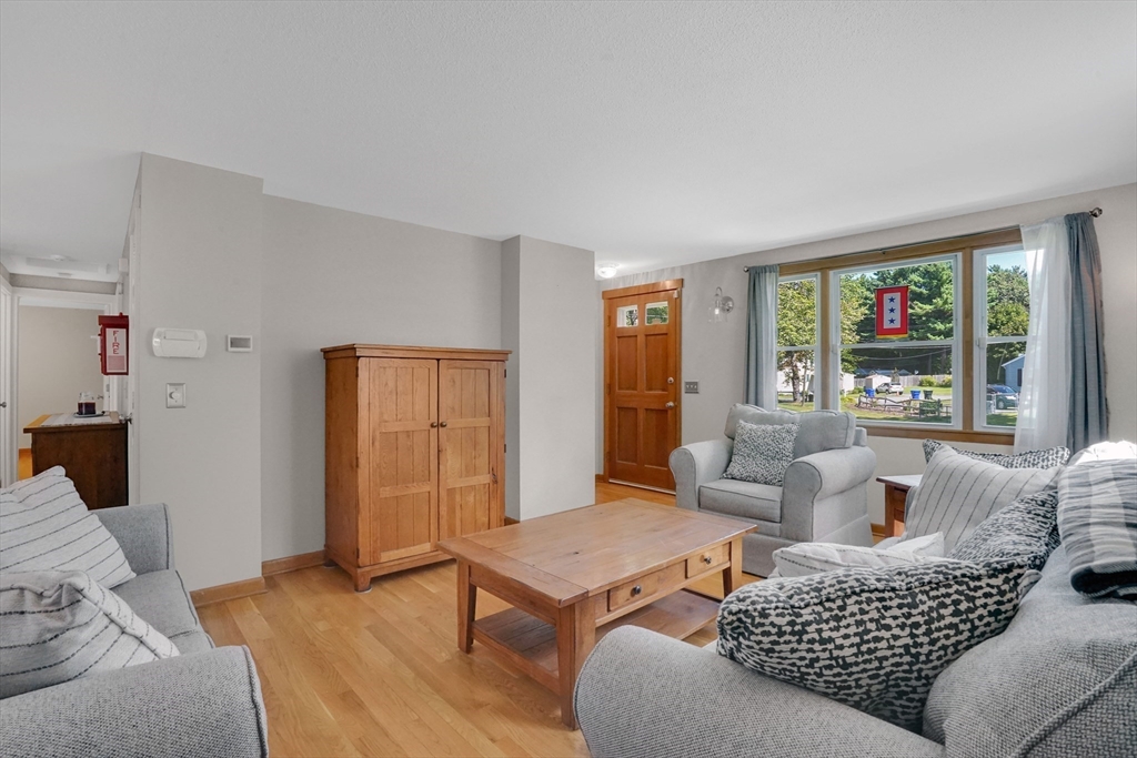19 Ruthven Street Springfield, MA 01128 - Photo 4 of 19 a living room with furniture and a window