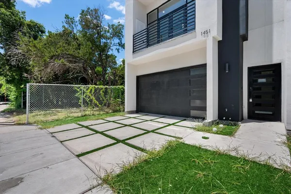 a backyard of a house with lots of green space