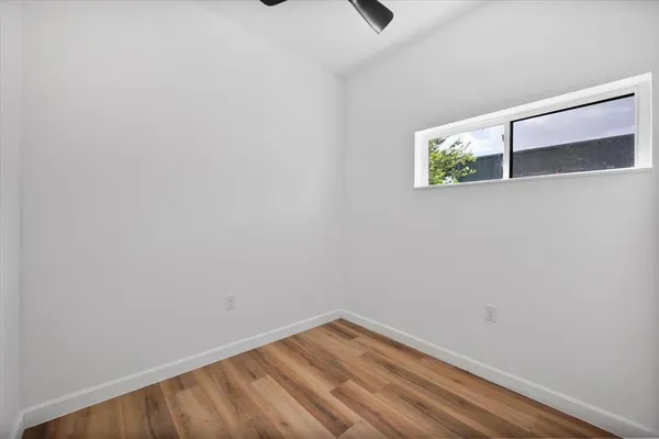 a view of small space with wooden floor