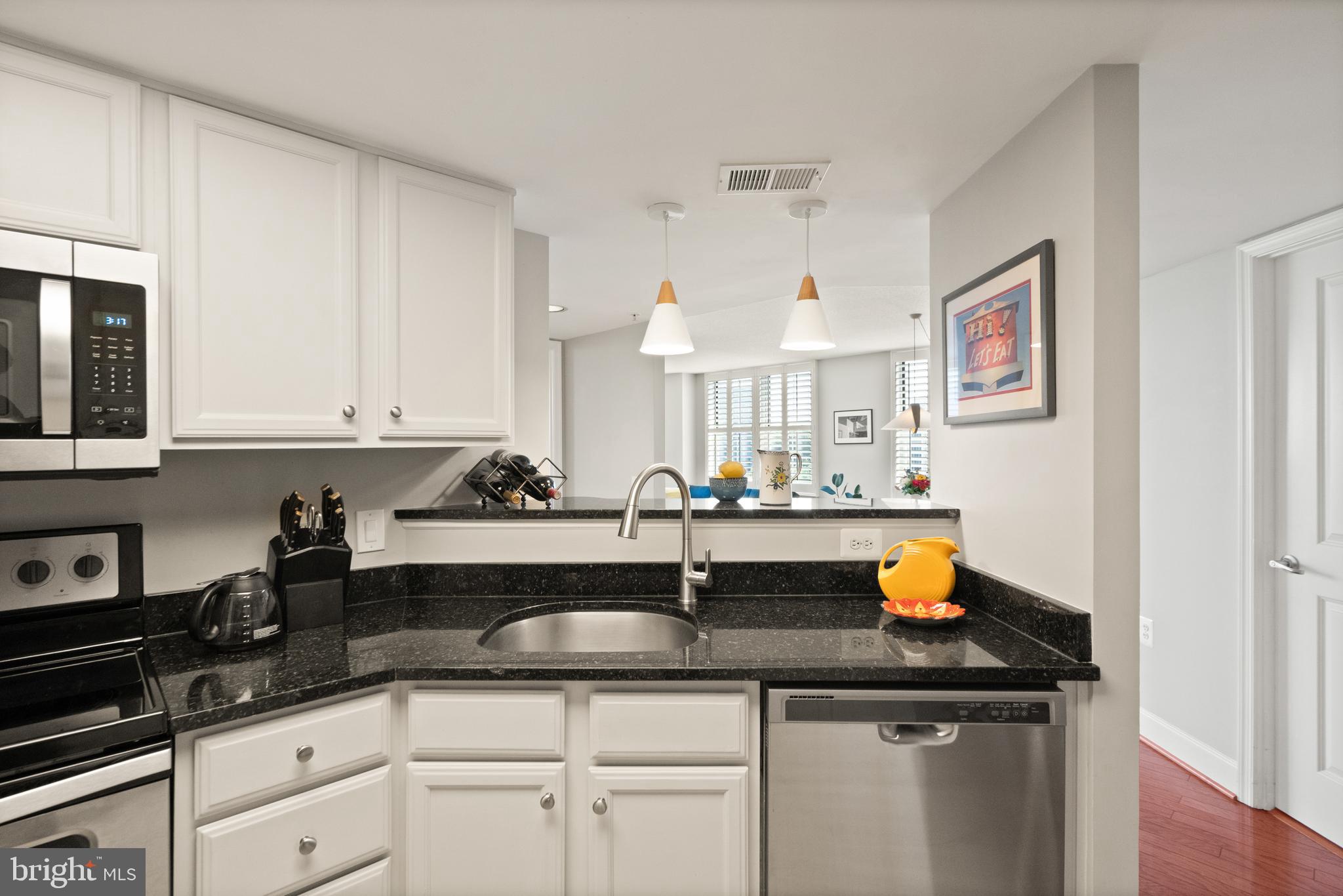 11800 Sunset Hills Road, Unit 1120 Reston, VA 20190 - Photo 11 of 61 Open to the dining room/living room