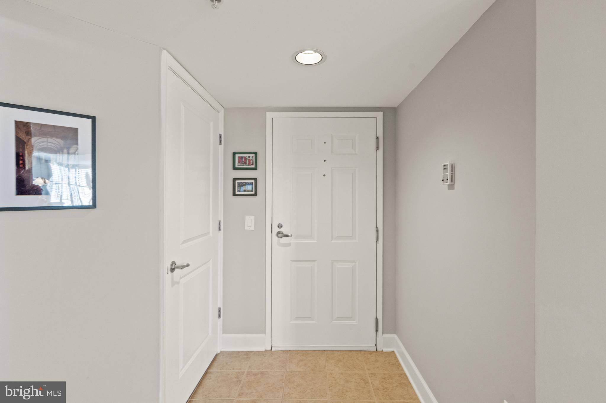 11800 Sunset Hills Road, Unit 1120 Reston, VA 20190 - Photo 7 of 61 Foyer with coat closet