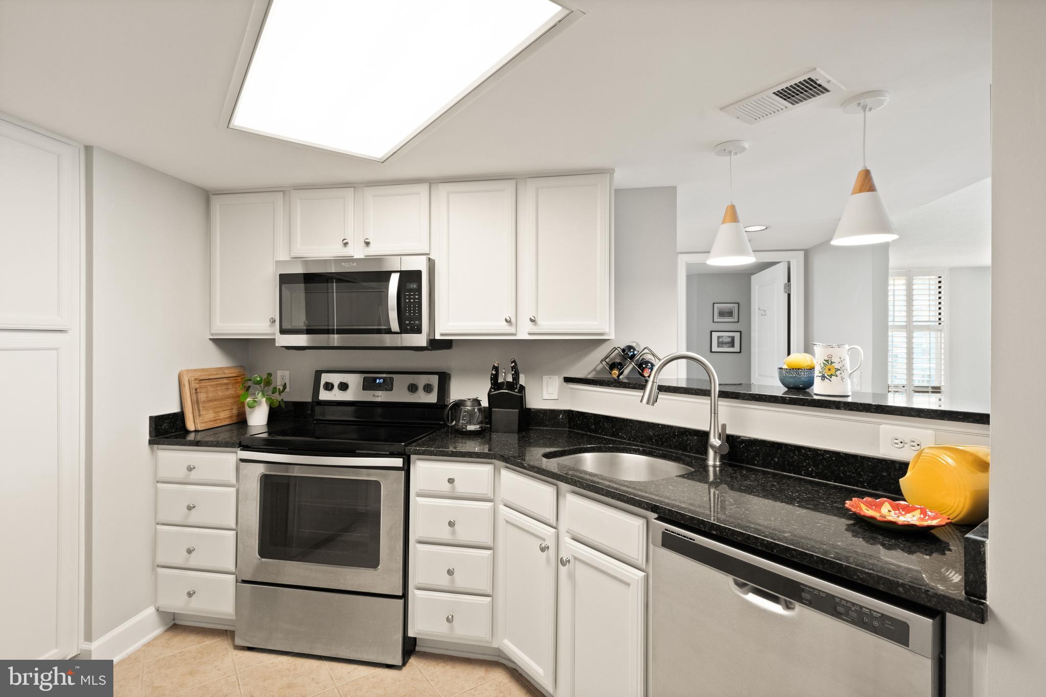 11800 Sunset Hills Road, Unit 1120 Reston, VA 20190 - Photo 9 of 61 Kitchen with stainless steel appliances