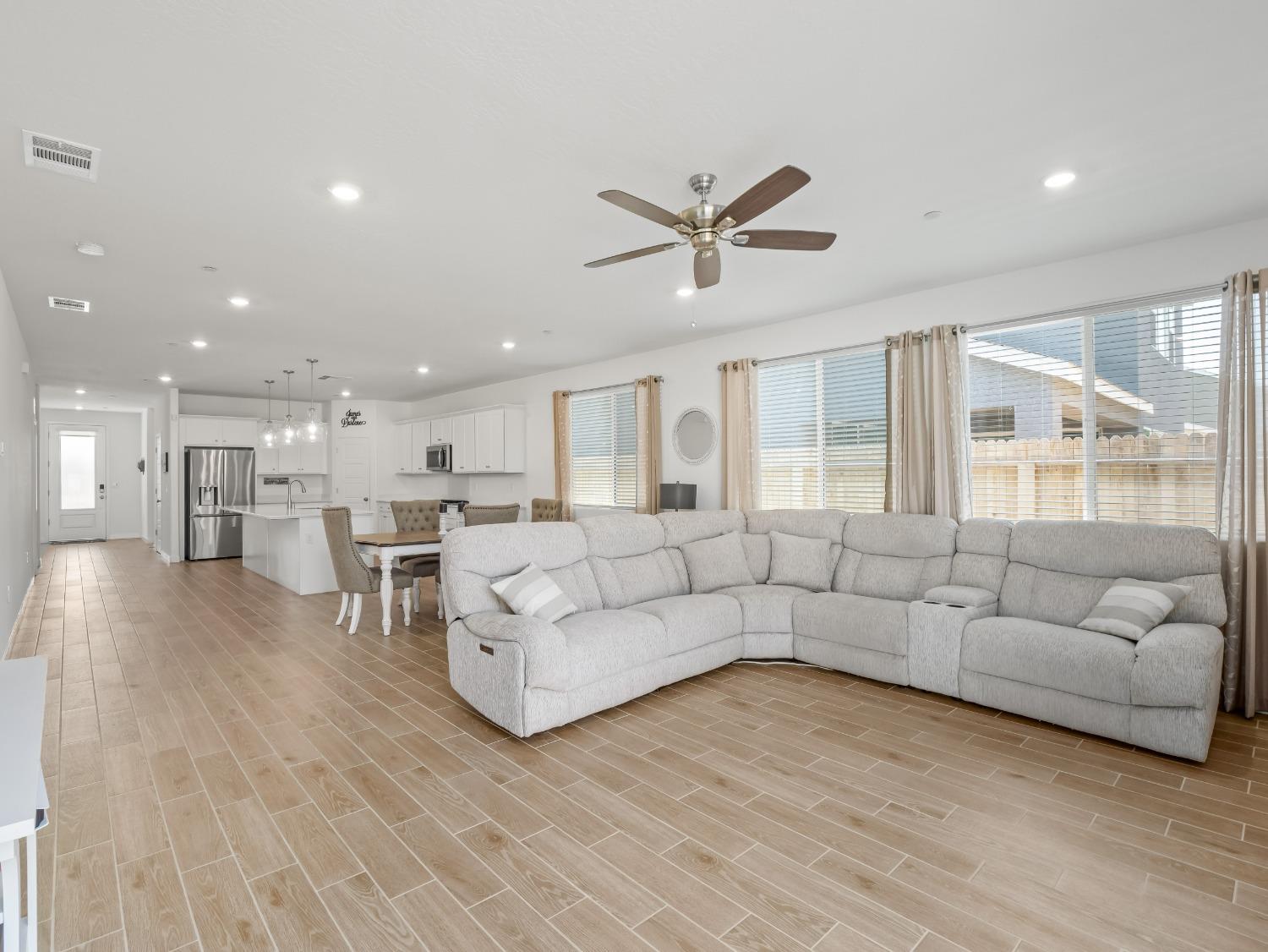 2682 Highland Avenue Clovis, CA 93619 - Photo 12 of 29 a living room with furniture and a large window