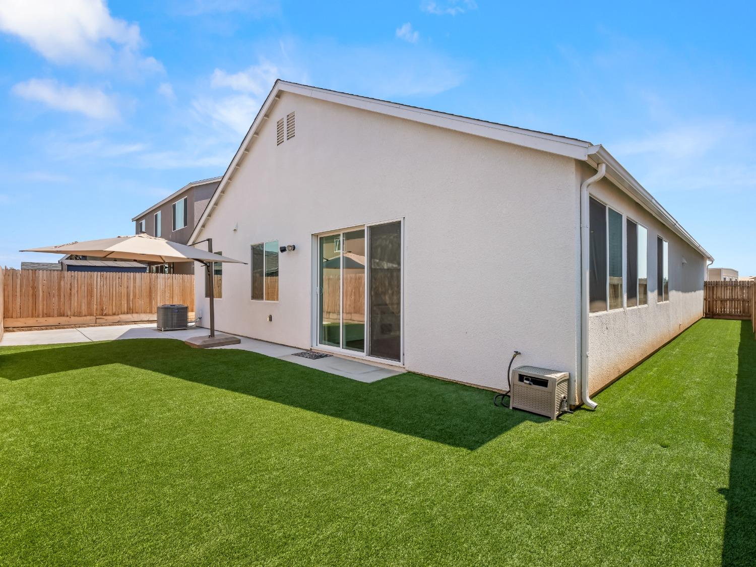 2682 Highland Avenue Clovis, CA 93619 - Photo 23 of 29 a view of a house with backyard