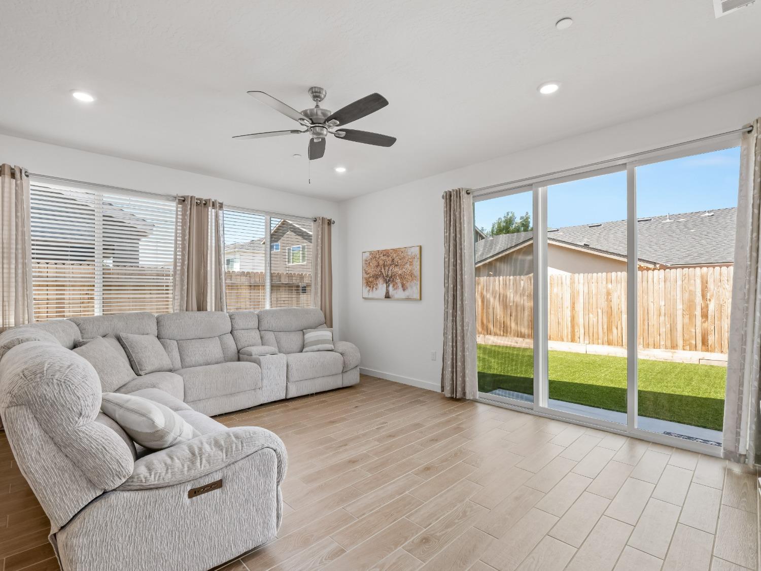 2682 Highland Avenue Clovis, CA 93619 - Photo 10 of 29 a living room with furniture and a large window