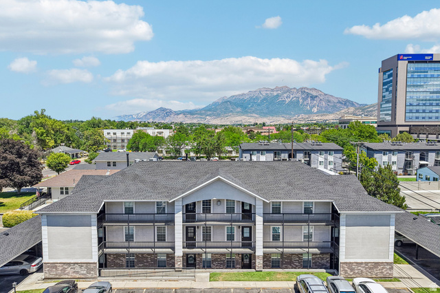 888 600 West, Unit 40 Provo, UT 84604 - Photo 15 of 19 Multi-level residential building featuring a gabled roofline and individual balconies