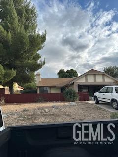 a view of house with outdoor space