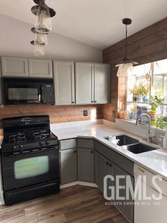 Undisclosed Address Tehachapi, CA 93561 - Photo 4 of 10 a kitchen with kitchen island granite countertop a sink stainless steel appliances and cabinets