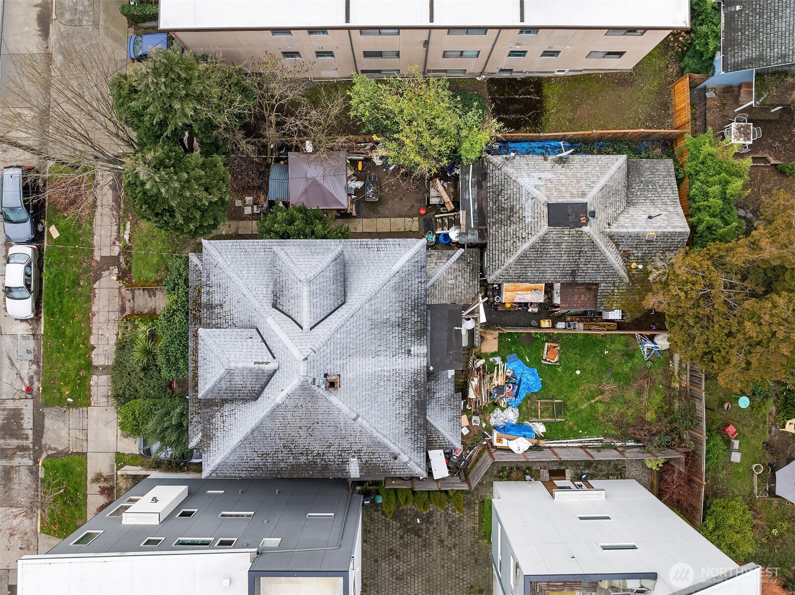 4309 Evanston Avenue North Seattle, WA 98103 - Photo 4 of 13 an aerial view of a house with a yard and a fountain