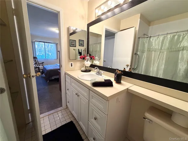 a kitchen with a sink and a refrigerator