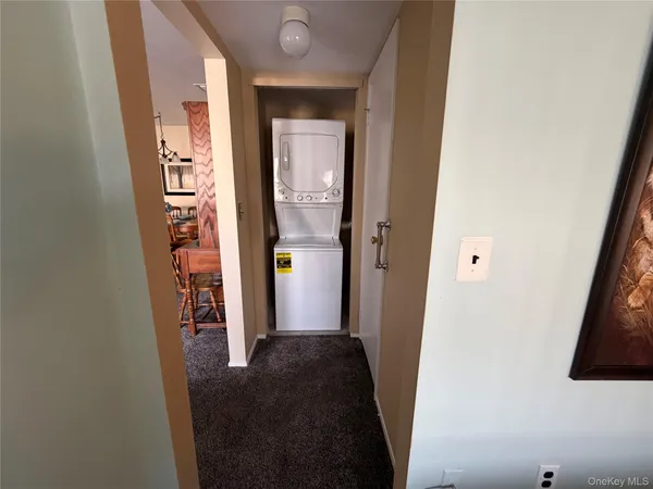 a bedroom with bed and window