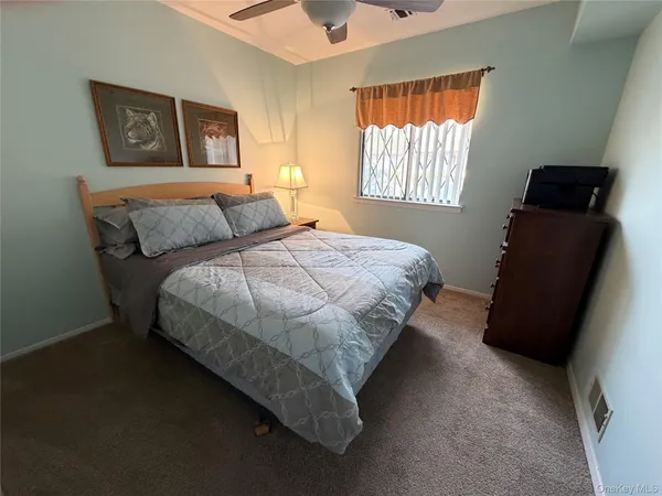 $449,000 | 141 Cambridge Drive, Unit 141, Copiague, NY 11726