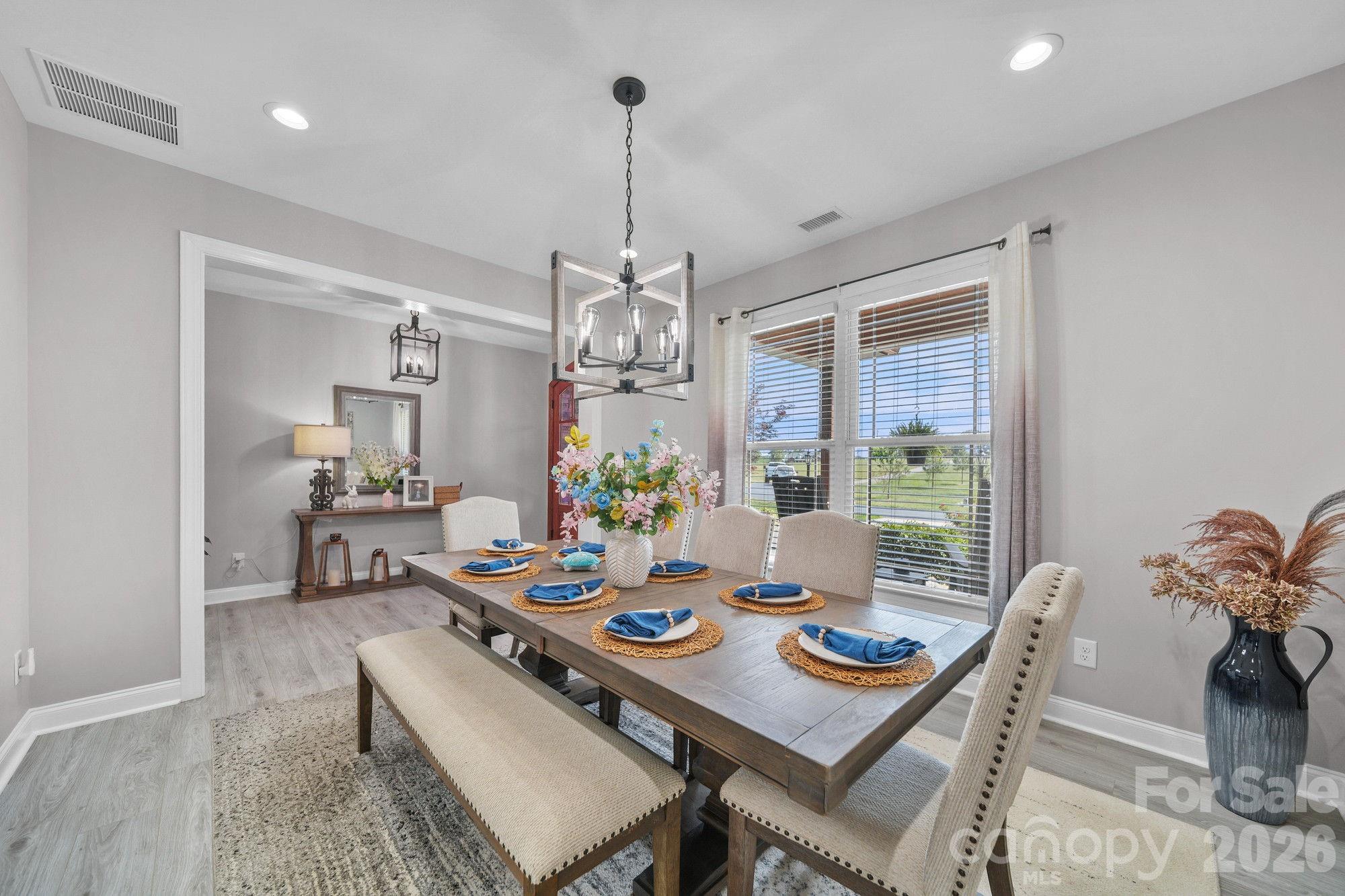 617 Caudle Road Peachland, NC 28133 - Photo 21 of 48 a view of a dining room with furniture window and outside view