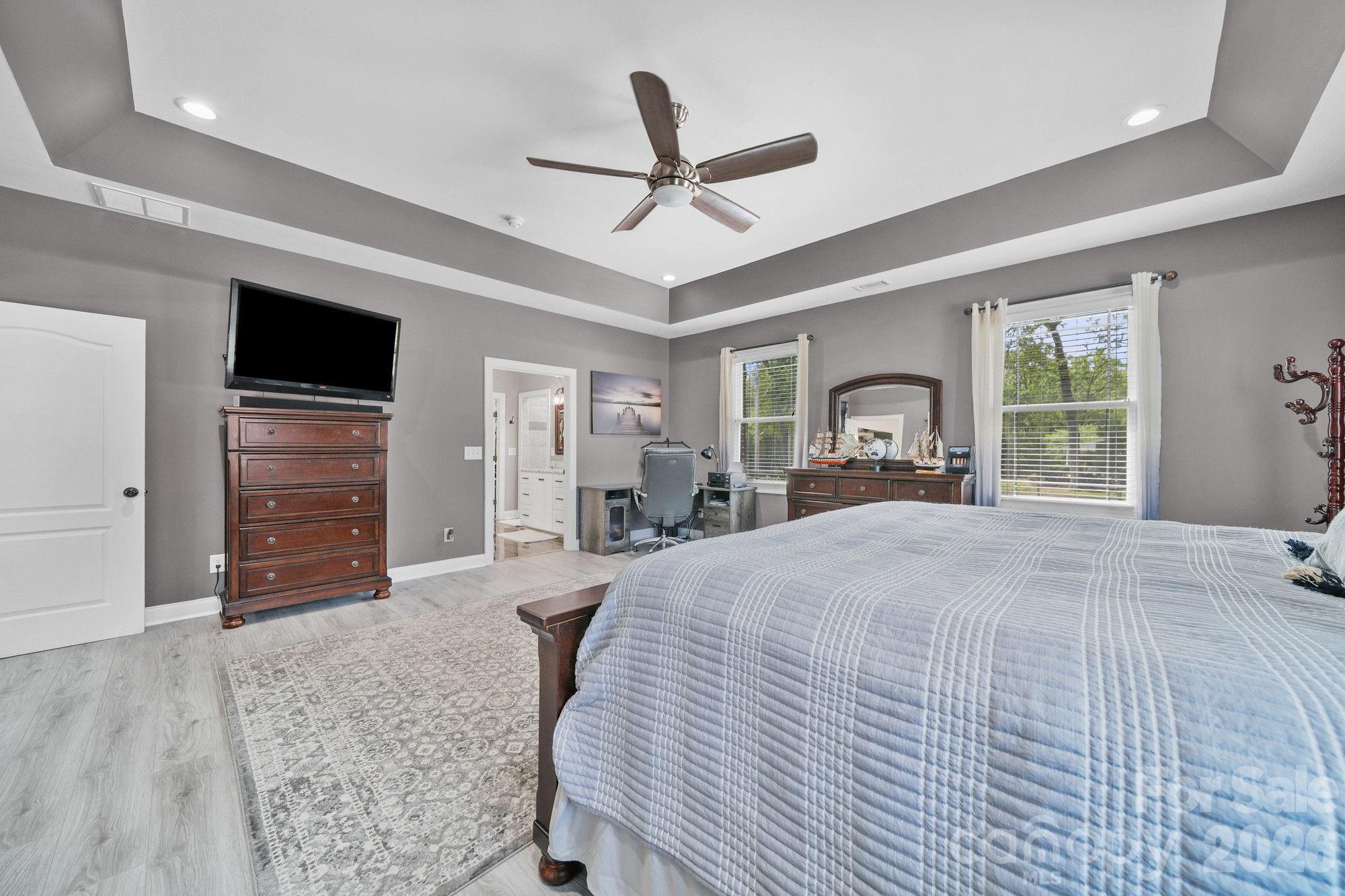 617 Caudle Road Peachland, NC 28133 - Photo 23 of 48 a bedroom with a bed and a flat screen tv