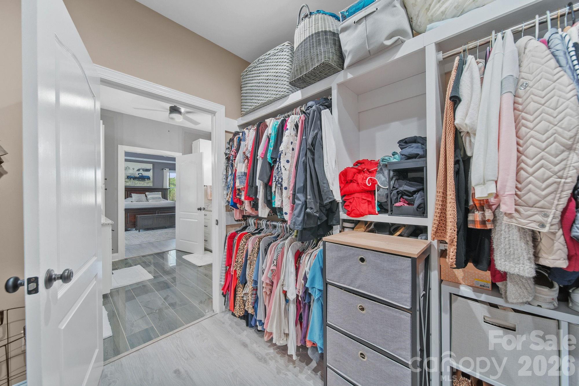 617 Caudle Road Peachland, NC 28133 - Photo 26 of 48 a view of walk in closet with clothes and shoes