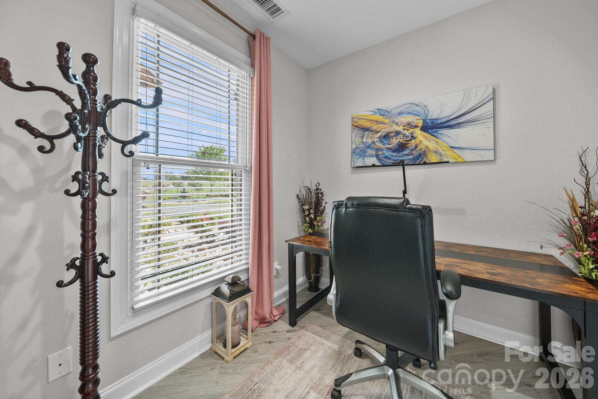 617 Caudle Road Peachland, NC 28133 - Photo 32 of 48 a view of a workspace with furniture and a window