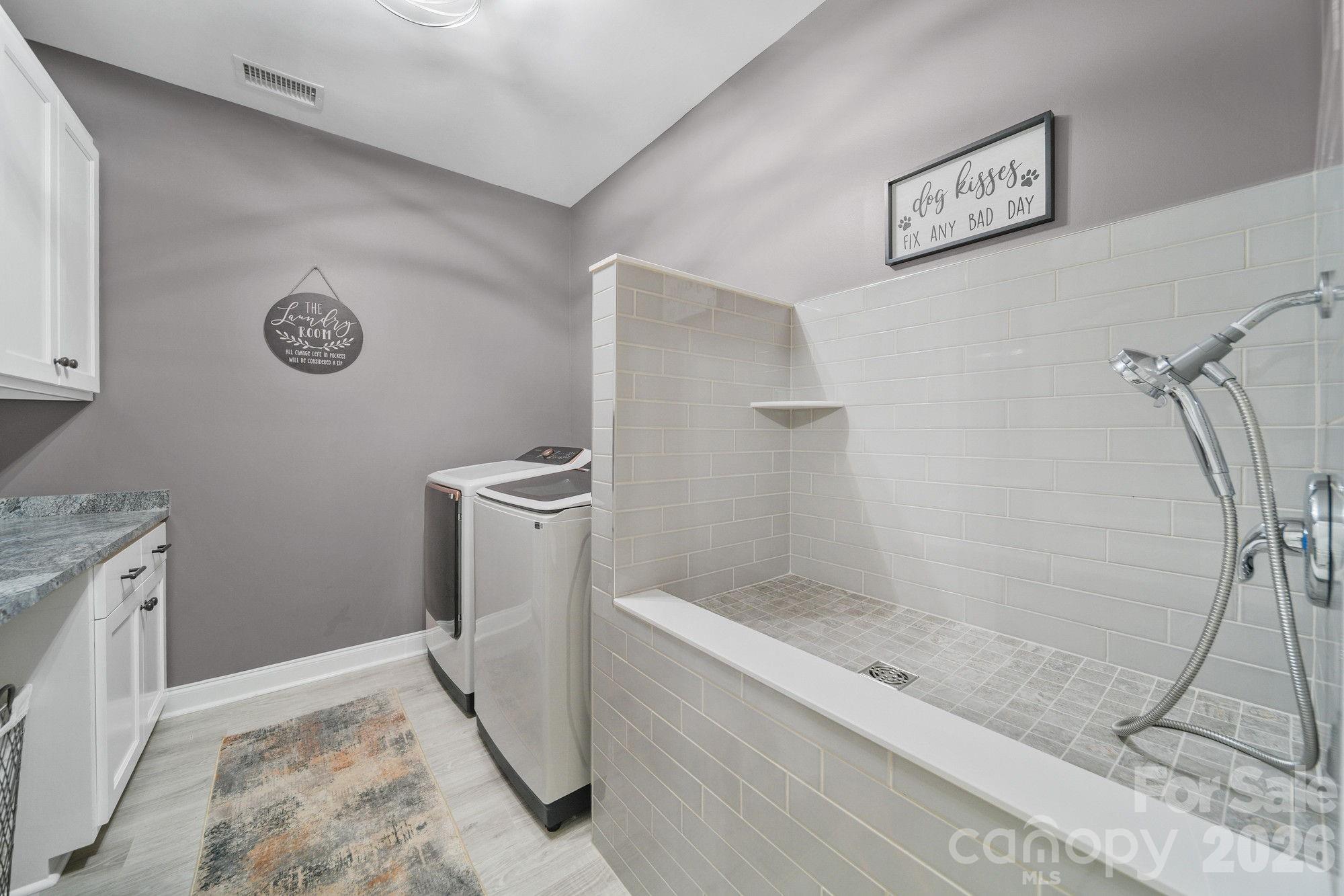 617 Caudle Road Peachland, NC 28133 - Photo 34 of 48 a bathroom with a granite countertop shower and a sink