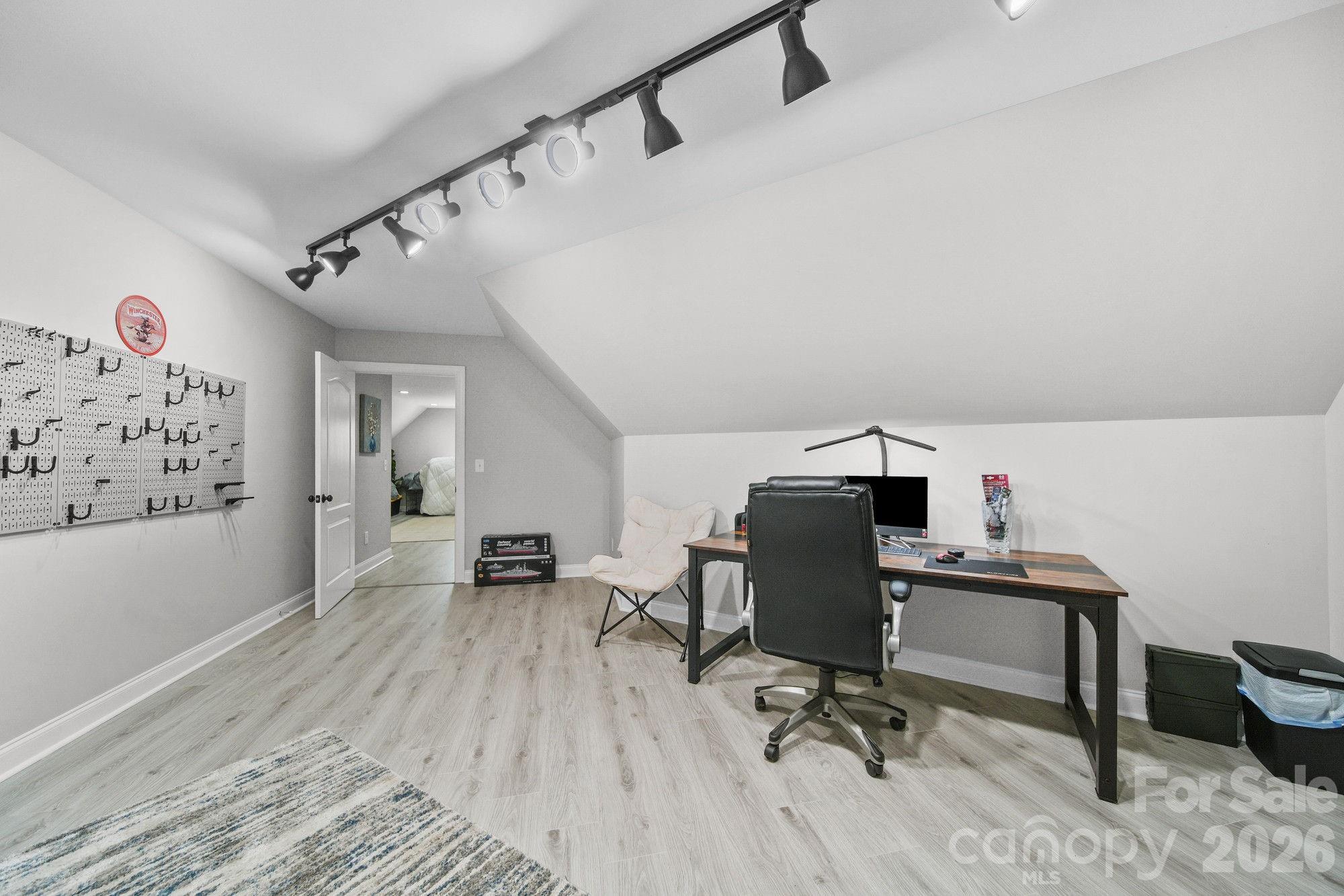 617 Caudle Road Peachland, NC 28133 - Photo 37 of 48 a view of a workspace with furniture and a window
