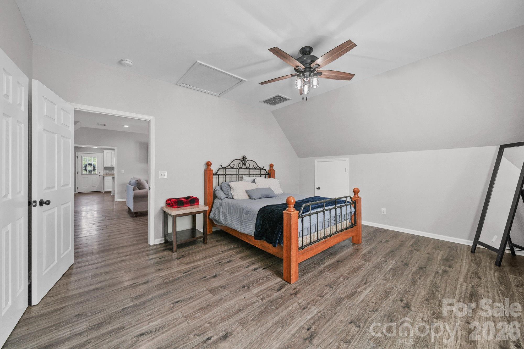 617 Caudle Road Peachland, NC 28133 - Photo 41 of 48 a bedroom with furniture and a wooden floor