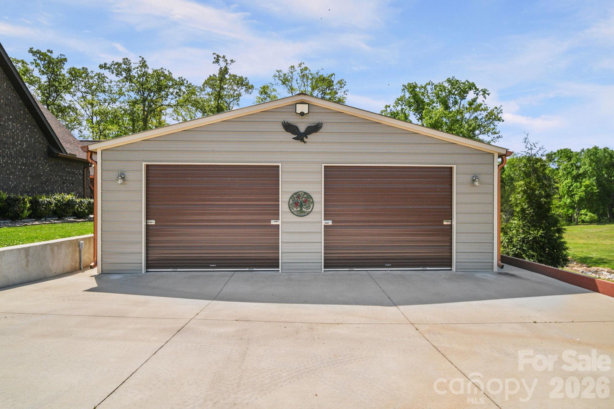 617 Caudle Road Peachland, NC 28133 - Photo 44 of 48 a view of backyard of house and garage