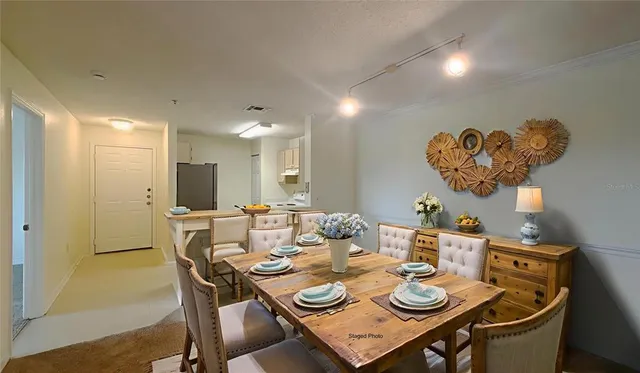 a view of a dining room with furniture