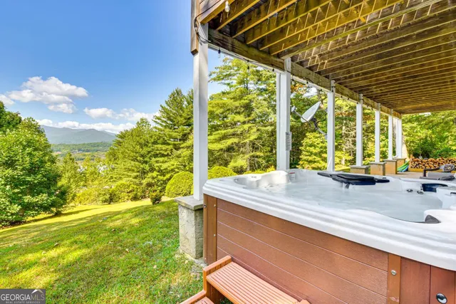a bathroom with a sink and a large window