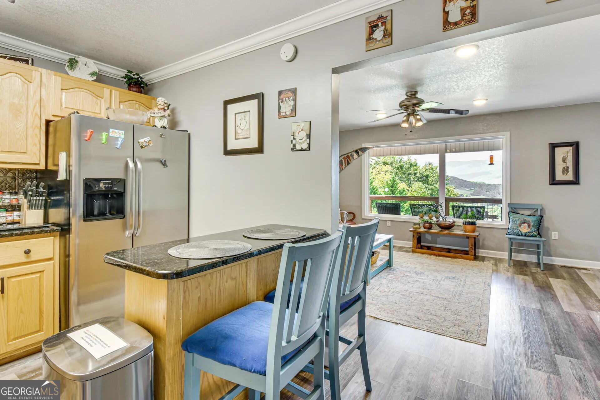 1912 Bearmeat Village Road Hiawassee, GA 30546 - Photo 8 of 23 a dining room with furniture and window