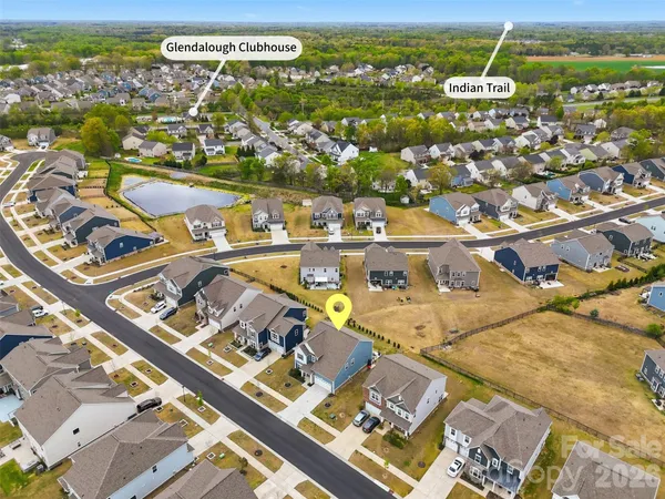 an aerial view of residential building with outdoor space