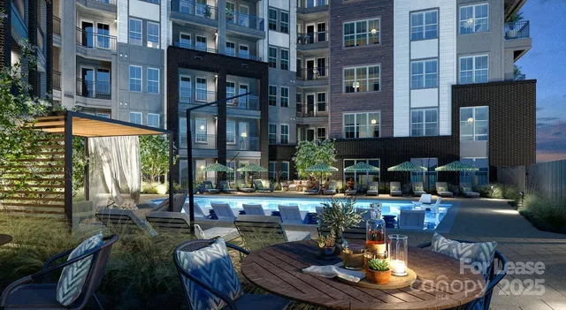 a view of a patio with a table and chairs and potted plants