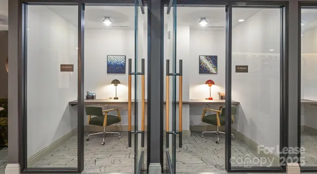 a kitchen with granite countertop a sink stainless steel appliances and cabinets