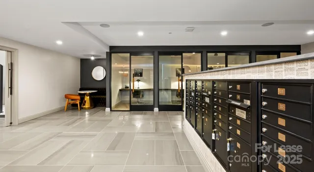 a view of livingroom with furniture and window