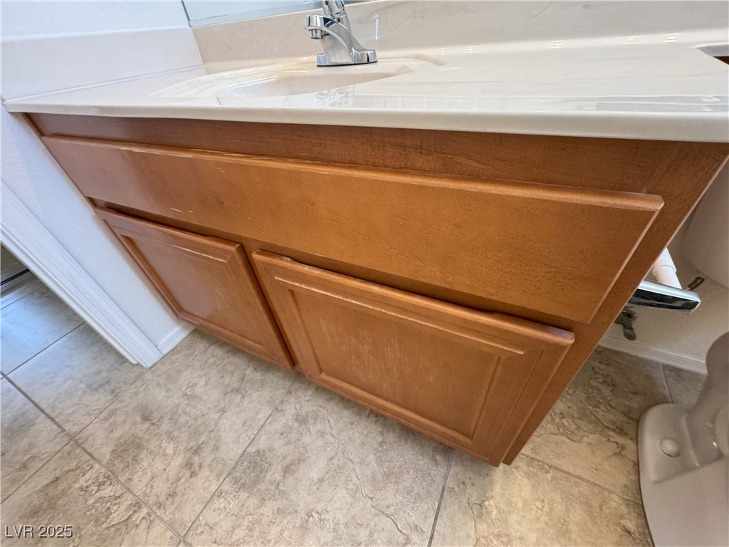 3013 Hartsville Road Henderson, NV 89052 - Photo 21 of 43 Room details featuring toilet and vanity
