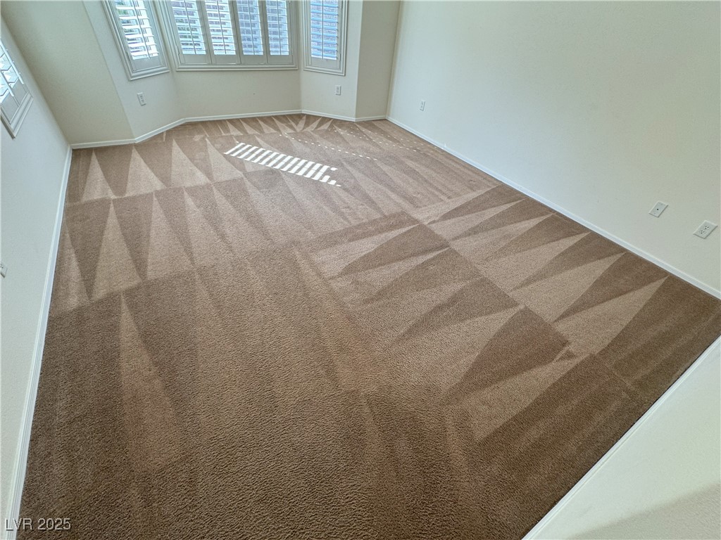 3013 Hartsville Road Henderson, NV 89052 - Photo 25 of 43 Carpeted empty room featuring baseboards