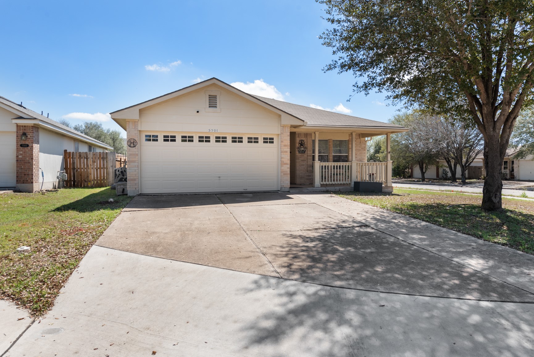 5501 English Avenue Austin, TX 78724 - Photo 19 of 19 a view of a house with a yard and large tree