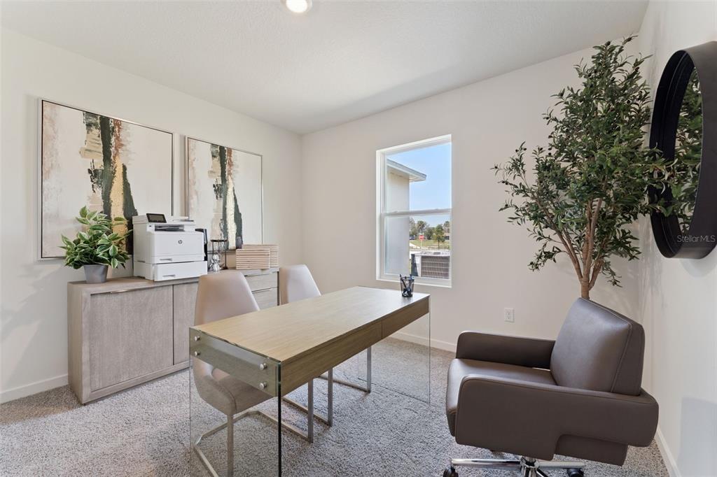 5115 Nickerbean Street Apopka, FL 32712 - Photo 14 of 16 a living room with furniture and a potted plant