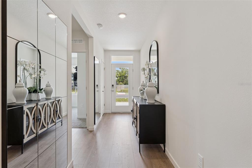5115 Nickerbean Street Apopka, FL 32712 - Photo 2 of 16 a view of a hallway with a livingroom