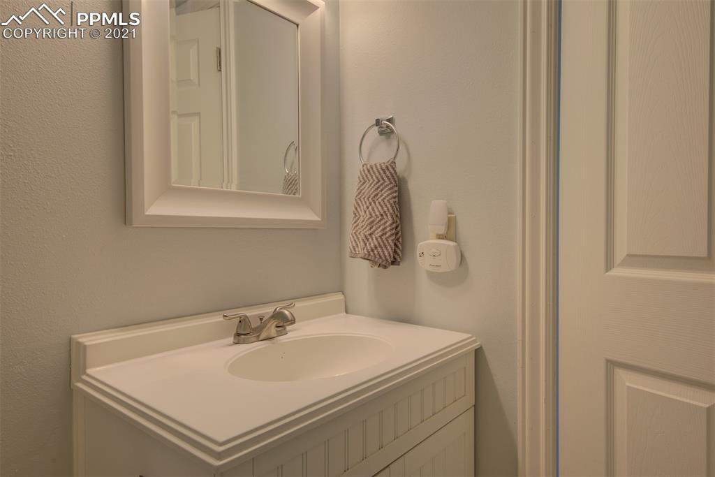 4509 North Carefree Circle Colorado Springs, CO 80917 - Photo 18 of 32 Updated half bath on the main level