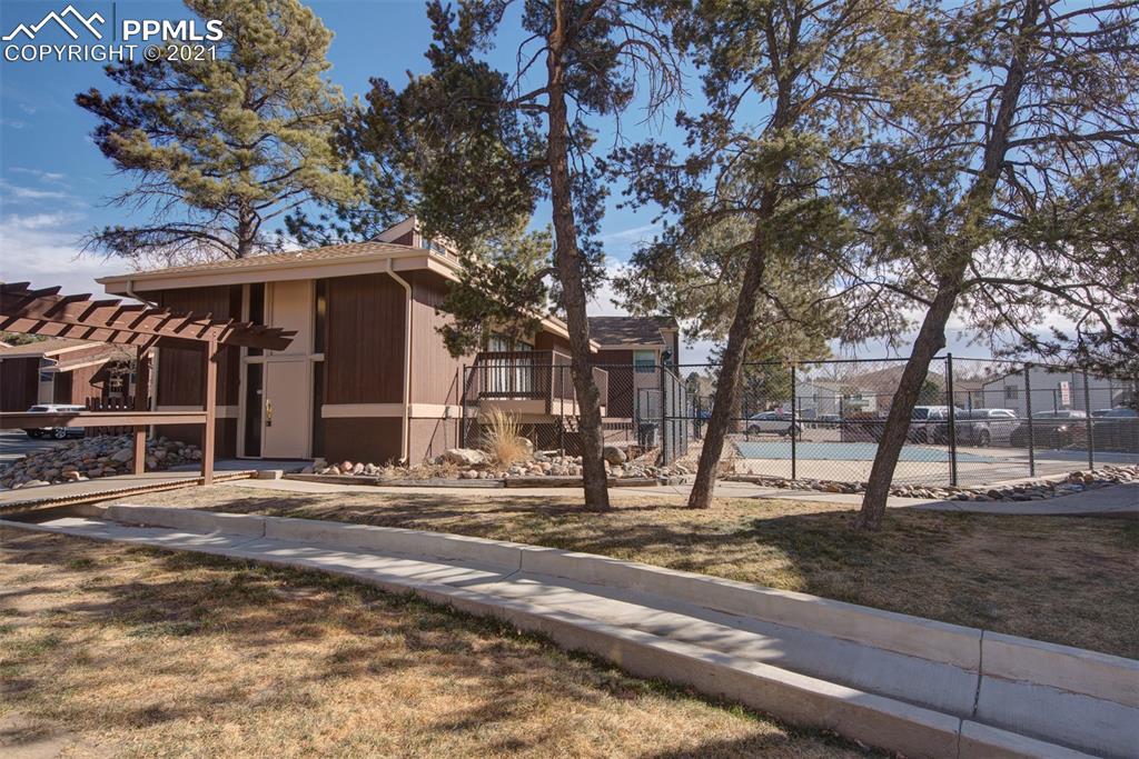 4509 North Carefree Circle Colorado Springs, CO 80917 - Photo 27 of 32 There is a community clubhouse next to the pool