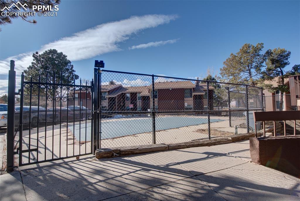 4509 North Carefree Circle Colorado Springs, CO 80917 - Photo 29 of 32 Enjoy the community swimming pool in the summer!