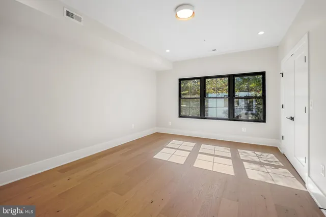 an empty room with windows